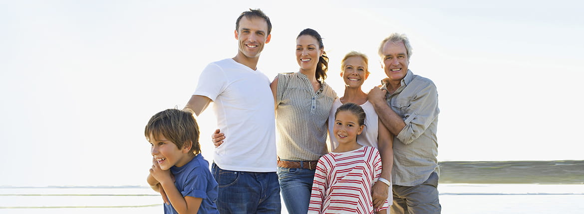 Six people standing and smiling.