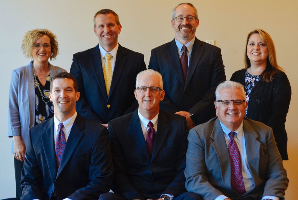 Goodwater Wealth Management Group team photo. (top row from left to right: Jaynie Guerrero, Greg Bowden, Doug Noble and Angie Spinner. Bottom row from left to right: Jason Smith, Rod Dahl and Joe French.)