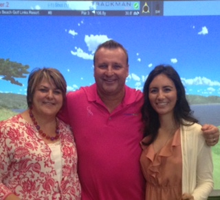 Lori Claro, Mick Graham, and Natalie Odisho are together at the Moon Golf: Give & Golf event for breast cancer research.