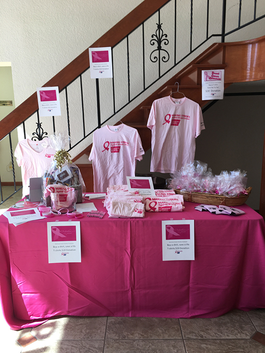 Suntree Business Center featured a pink table for breast cancer shirts in October. Cotton designs were available for men and women.