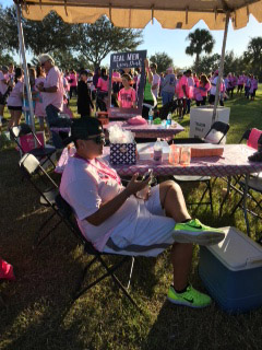 Participants of the Making Strides breast cancer benefit take a rest from the 5k walk.