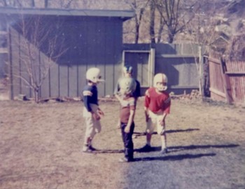 young boys in football helmets