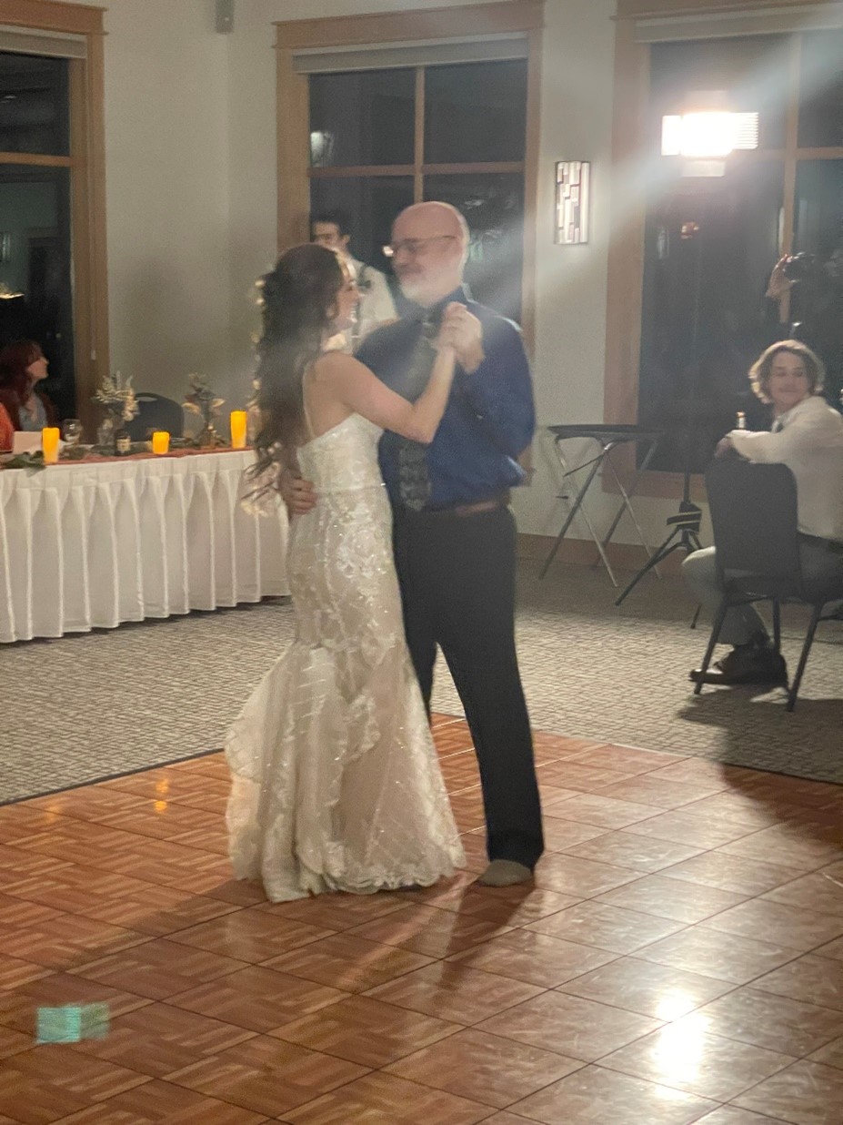 Matt dancing with his daughter at her wedding